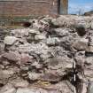 Watching brief, View of refectory wall prior to removal of loose wall core, Coldingham Priory