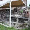 Watching brief, View of lapidarium wall after removal of fonts, Coldingham Priory