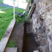 Watching brief, View of sandstone block below present ground surface, Coldingham Priory