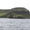 Historic Building Survey photograph, From SE, Coroghan Castle, The surrounding landscape seen from the sea, Coroghon Castle, Canna