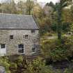 View of former carding mill from north. This has recently been rebuilt by the current occupants of the Bridgend/Redhouses woolen mill.