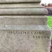 The signature of Malcolm & Laing, a local stone mason in East Linton, on the base of a gravestone.