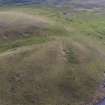 Oblique aerial view centred on the burial cairn, Fall Hill