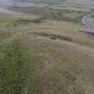Oblique aerial view centred on the burial cairn, Fall Hill