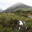 Digital photograph of panel in context with scale, from Scotland's Rock Art Project, Tigh Geal, Highland