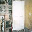 Historic building survey, Room 17, N and W walls including door D13a (closed), Upper Square, Hynish, Argyll and Bute