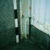 Historic building survey, Room 18, Detail of timber at base of door D14, Upper Square, Hynish, Argyll and Bute