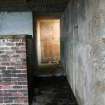 E Gun Emplacement: view SW from the gun compartment to the corridor leading to the W entrance 