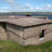 E Gun Emplacement: the small hut to the rear from the W 