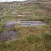 View from the WSW showing the guttering in the floor of the lavatory 