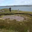 The light anti-aircraft gun enclosure from the SW with the Admiralty hydrographic survey pillar (NG89SW 4.18) beyond 