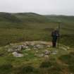 Georgina Brown plotting the western shieling hut by dGPS.