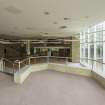 Sub-basement.  Restaurant. View from raised area showing main restaurant space and windows to landscaped garden.