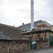 1990 New wing and chimney. View from north.