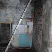 Standing Building Recording photograph, Direction to S, Tiles and modern plaster F2, Colquhoun Arms Hotel, Luss 
