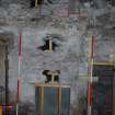Standing Building Recording photograph, Direction to S, Fireplace F4 and holes cut in in 2011 to look for flues, note soot from
leaking flue, Colquhoun Arms Hotel, Luss 
