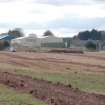 Excavation photograph, Looking SW showing site in slight dip in field, new Mearns Academy site, Laurencekirk, Aberdeenshire