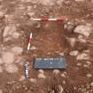Excavation photograph, Small section (outlined by rulers) through cobbles 5, new Mearns Academy site, Laurencekirk, Aberdeenshire