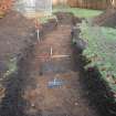 Evaluation photograph, Trench 1 looking N with feature 4 in foreground, Proposed play area, Brodie Castle, Moray