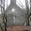 Survey photograph of Gardeners Cottage, N wall, looking S, wash house in foreground, Blairs College and Estate 