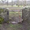 View of iron kissing gate from South