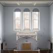 View of courtroom arched windows and canopy from gallery