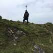D Bratt surveying the line of the outer wall