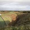 View of W30 from west. WW2 magazine (Nissen Hut) inside re-used WW1 blast mound