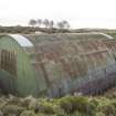 View of WW2 Nissen Hut W30 from south east in re-used WW1 blast mound of Nitroglycerine Hill No.3u.