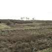 View from NW of WW1 blast mounds (of two of the three Final Wash Houses) of former Nitroglycerine Hill No.3 reused in WW2 for Nissen Hut magazines. The tramways which served them are visible in the foreground.