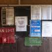 Interior of Nissen Hut magazine W4 noticeboard. There was a limit of 6 personnel at any one time. The magazine was last used 2011.