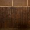 Interior of WW2 Nissen Hut magazine W4. View of wooden wall lining.