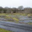 View from east south east of foundations of Pyrites, Fines and Sulphur Storehouses