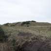 View of WW2 explosives magazine blast mound and railway entrance