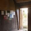 Interior WW2 Nissen Hut magazine W4 showing access door and rail track