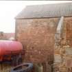 Historic Building Survey photograph, Direction facing NE, N end of building B, west elevation. North wall of lean-to structure J 