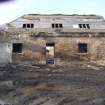 Historic Building Survey photograph, Direction facing NW, Building D, South elevation, Remnants of south gable from building F to the east, Goshen Farm 