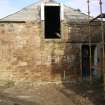 Historic Building Survey photograph, Direction facing NE, Building D, West gable, Slapped through door at south end, 1st floor loading door in middle of gable, Goshen Farm 