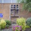View of stained-glass windows from exterior during removal