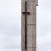 Detail of cross on concrete tower