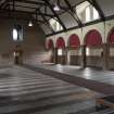 Interior looking northwest view of Nave towards Narthex.