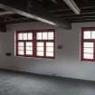 Interior. Brewhouse, 2nd floor, Grist Cases area. View of windows.