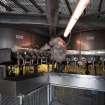 Interior. Brewhouse, 1st floor mezzanine, Mash Tun area. View of area below Mash Tuns 1 and 2.