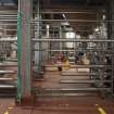 Interior. Kegging Hall. View of steel pipework carrying beer between tanks.