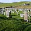 View showing graveyard with propped stones