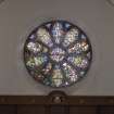 Detail of  Chancel east rose window gifted by Rev W Jardine and Mrs Dobie