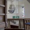 Detail of hanging ship model above entrance to Sailor's Aisle