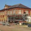 Site photograph, Station building with South elevation fire escape removed and scaffolding, Granton Gasworks, Edinburgh, Scotland