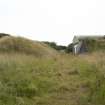 View of railway access through blast mound of WW2 explosives magazine R30 (modified 20th century)