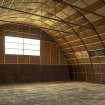 Interior of WW2 Nissen Hut magazine W30 showing its construction of steel frame bolted to a concrete floor 'raft' 